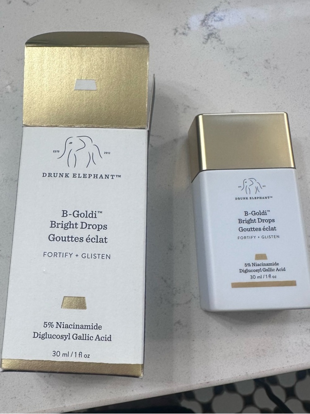 Drunk Elephant White Box with Gold Foil Accents
